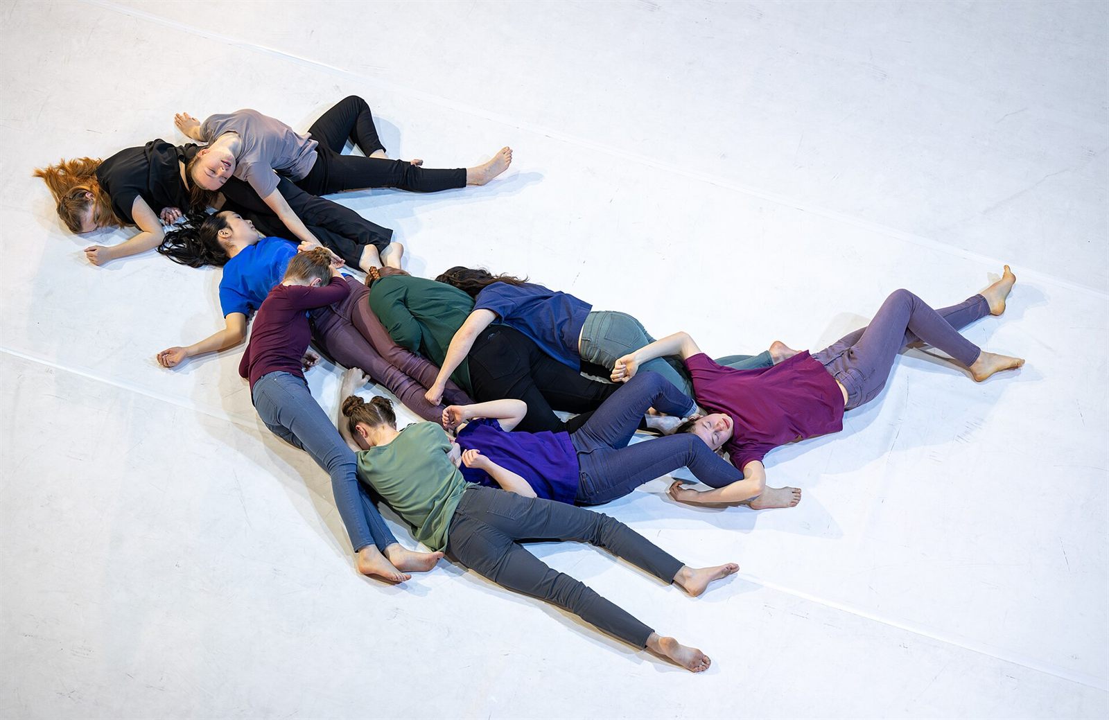 A modern dancer mid-phrase in a studio
